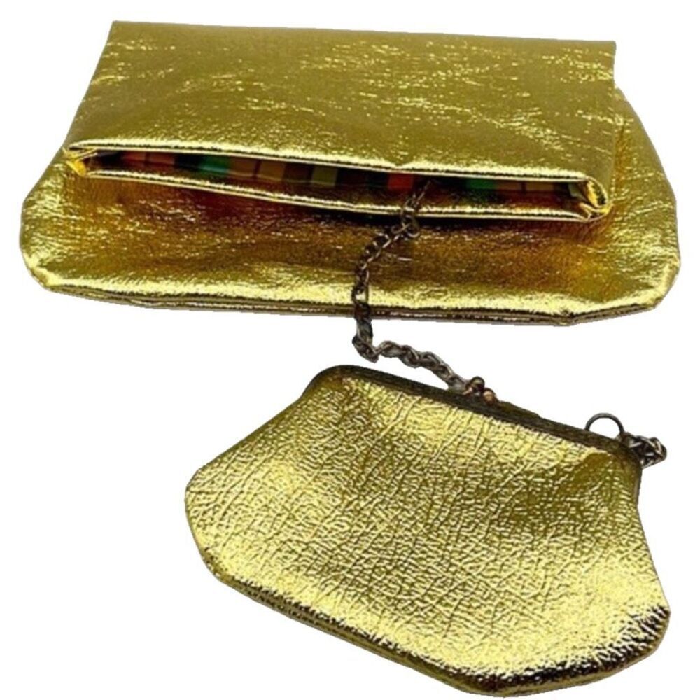Vintage MOD gold clutch with attached chain purse.